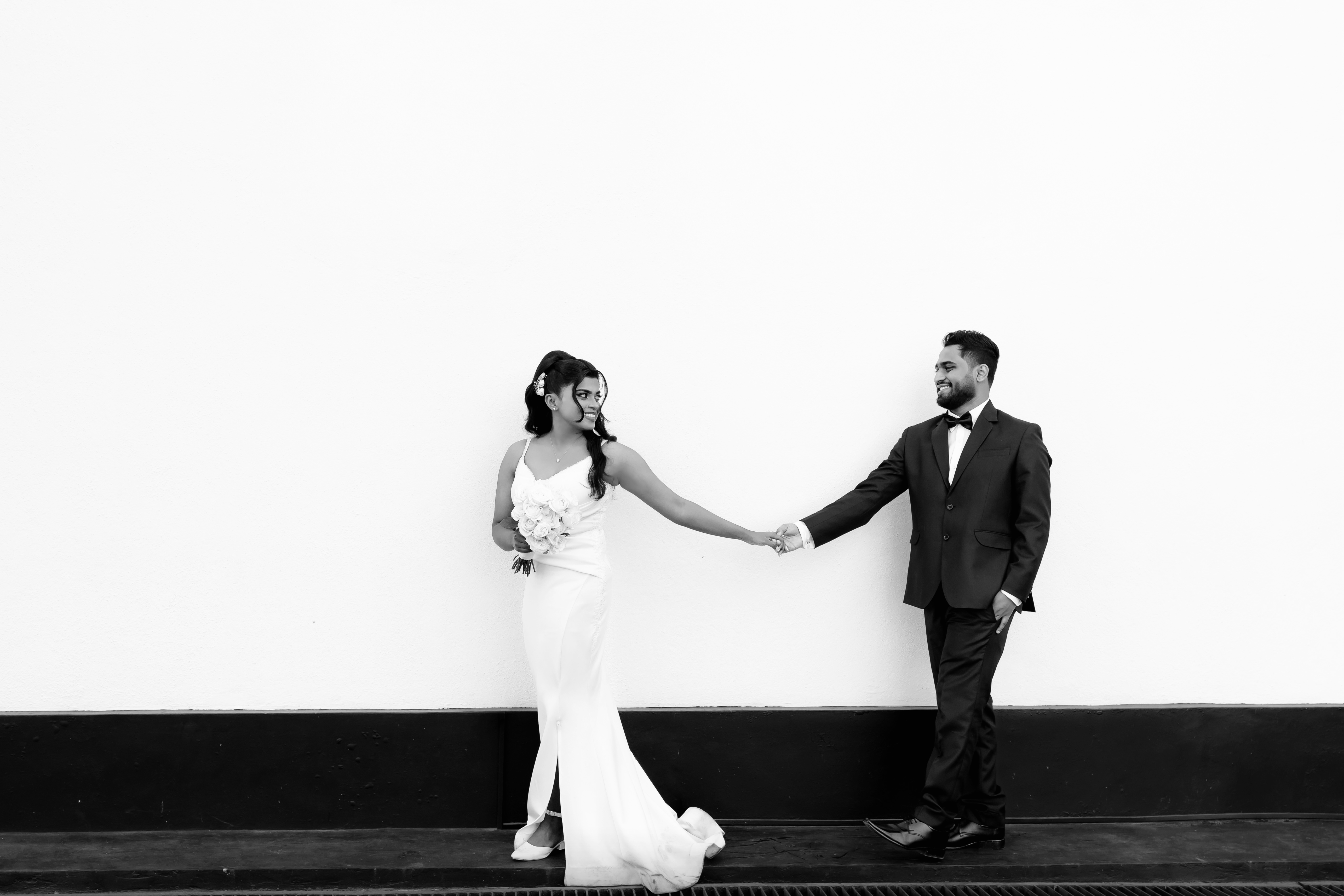 Replace with a black and white portrait of the couple